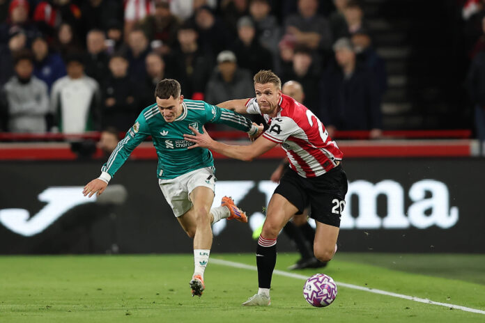 25th October 2025 Gtech Community Stadium, Brentford, London, England Premier League Football, Brentford versus Liverpool Florian Wirtz of Liverpool and Kristoffer Ajer of Brentford compete for the ball PUBLICATIONxNOTxINxUK KatiexChan
